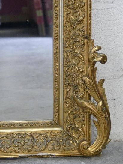 Mirror with gilded stucco and wood frame.
Late...