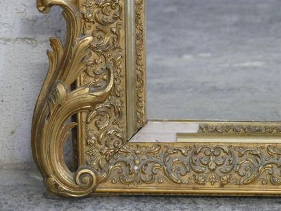 Mirror with gilded stucco and wood frame.
Late...