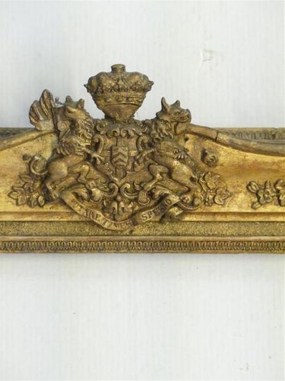 Wooden frame and gilded stucco surmounted...