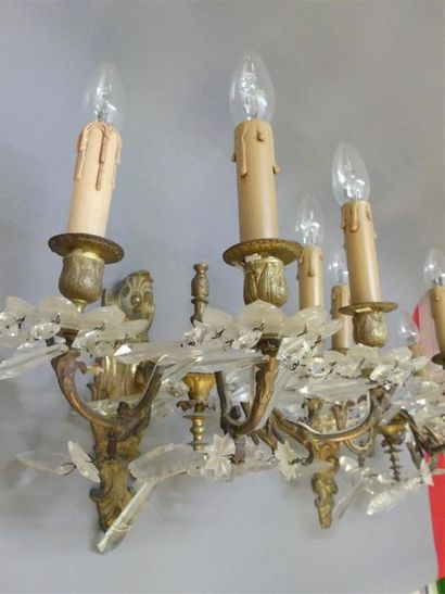 Paire d'appliques en bronze à quatre lumières...