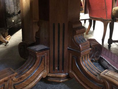 Table with central foot in walnut and stained...