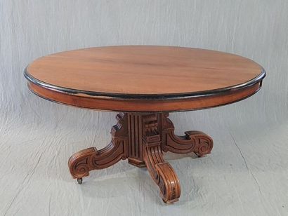 Table with central foot in walnut and stained...