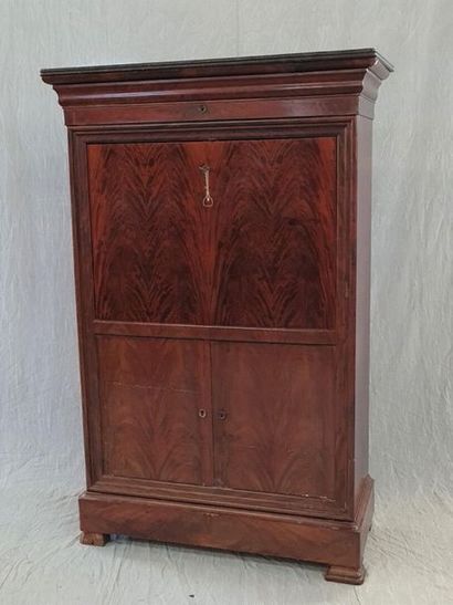 Upright mahogany secretary, the flap revealing...