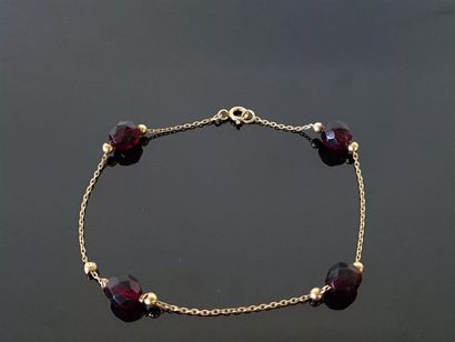 Bracelet in 750°/00 gold, punctuated by four...