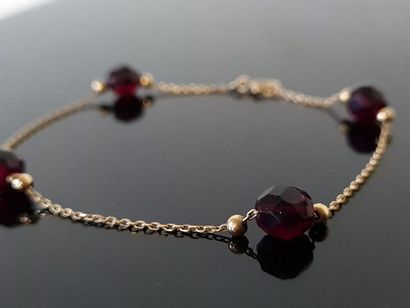 Bracelet in 750°/00 gold, punctuated by four...