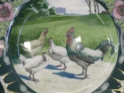 Assiette en porcelaine à décor de poule et...
