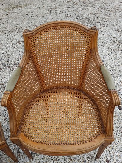 Suite of four armchairs and two cane chairs.

Louis...