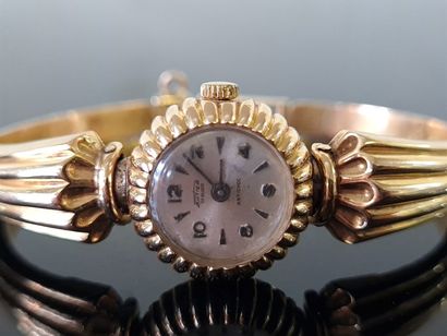 Lady's watch, articulated bracelet in gold...