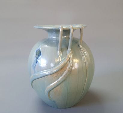 Jean LECLERC ( XX°

Vase oblong à décor de...