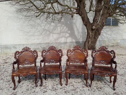 
217 BIS / Suite of four armchairs in exotic...
