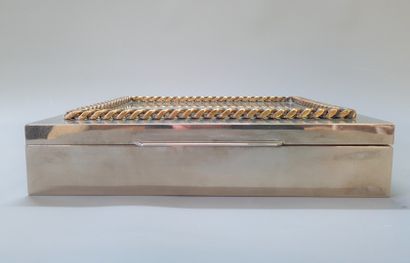 Silver plated metal box, underlined by a...