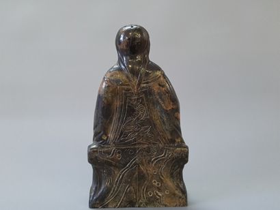 Sculpture en bronze patiné figurant un sage...