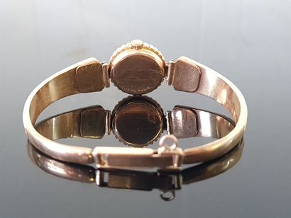 Lady's watch, articulated bracelet in gold...