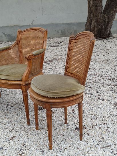 Suite of four armchairs and two cane chairs.

Louis...