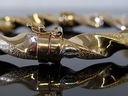 Articulated twisted rigid bracelet in 750°/00...