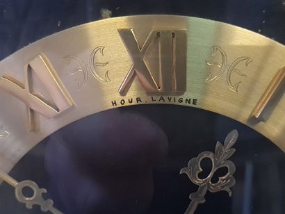 HOUR LAVIGNE 

Clock in gilded and lacquered...