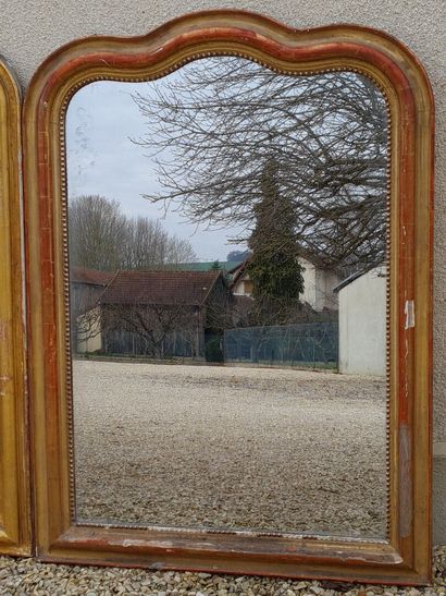 Paire de grands miroirs à frontons chantournés.

XIX°...