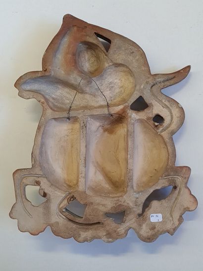 Glazed ceramic bas relief depicting an Asian...