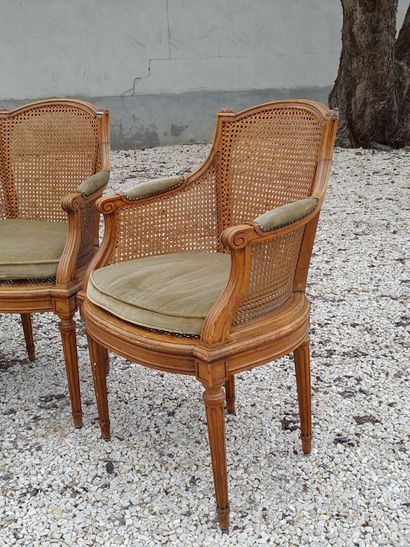 Suite of four armchairs and two cane chairs.

Louis...