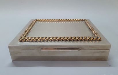Silver plated metal box, underlined by a...