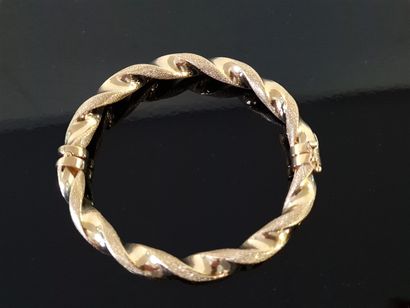 Articulated twisted rigid bracelet in 750°/00...
