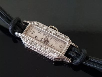 Watch in 750°/00 white gold set with small...