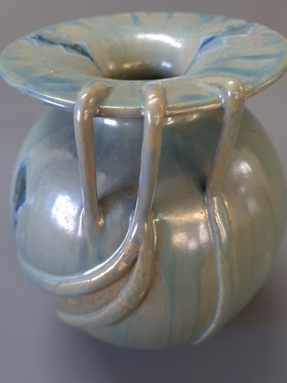 Jean LECLERC ( XX°

Vase oblong à décor de...