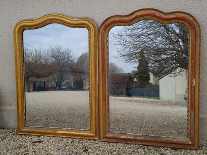 Paire de grands miroirs à frontons chantournés.

XIX°...