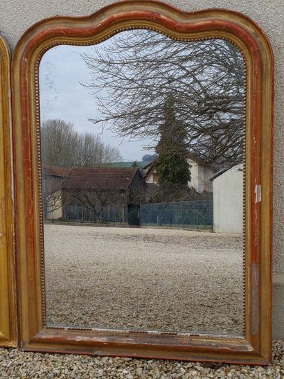 Paire de grands miroirs à frontons chantournés.

XIX°...