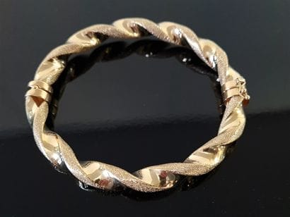 Articulated twisted rigid bracelet in 750°/00...