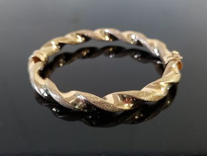 Articulated twisted rigid bracelet in 750°/00...
