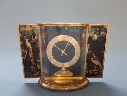 HOUR LAVIGNE 

Clock in gilded and lacquered...