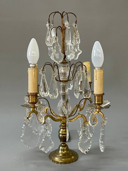 Paire de girandoles à quatre lumières et...