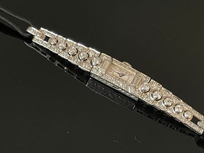 Montre en platine et diamants, bracelet lien...