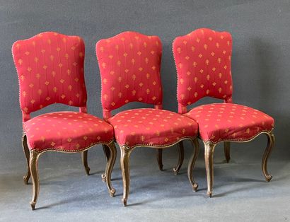 Série de six chaises en bois laqué, garnies...