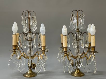 Paire de girandoles à quatre lumières et...
