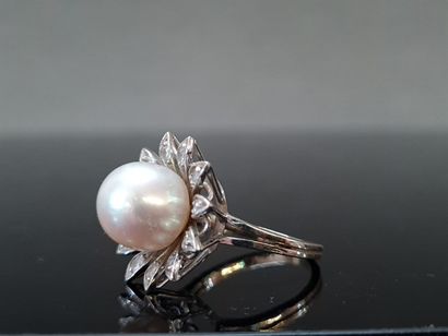 Bague en or gris 750°/00 sertie d'une importante...