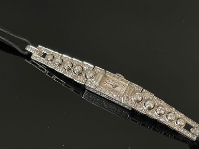 Montre en platine et diamants, bracelet lien...