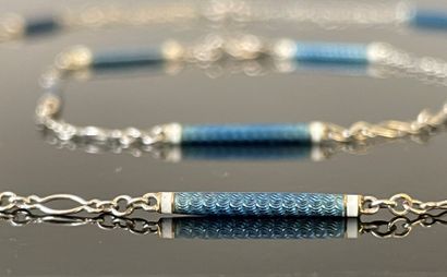Parure comprenant une chaîne et un bracelet...