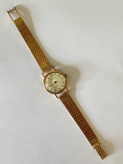 UNIVERSAL Genève, Montre de dame en or 750°/00,...