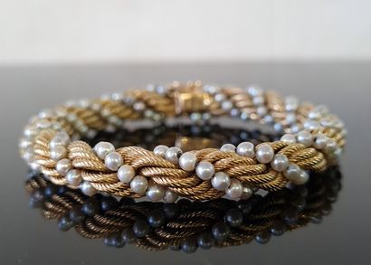 Bracelet souple en or torsadé entrelacé de...
