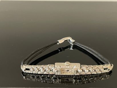 Montre en platine et diamants, bracelet lien...