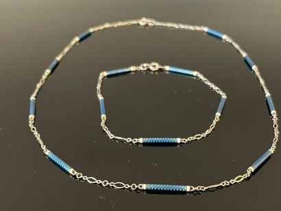 Parure comprenant une chaîne et un bracelet...