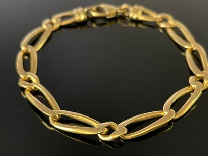 Bracelet gourmette en or 750°/00.

12.85...