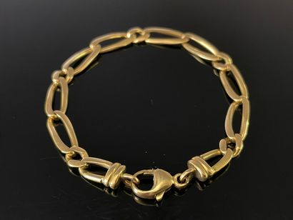 Bracelet gourmette en or 750°/00.

12.85...