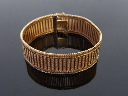 Bracelet manchette en or 750°/00.

Poids:...