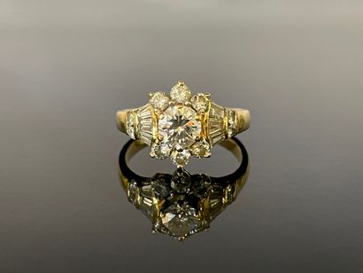 Bague en or jaune 750°/00, sertie d'un diamant...