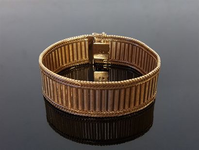 Bracelet manchette en or 750°/00.

Poids:...
