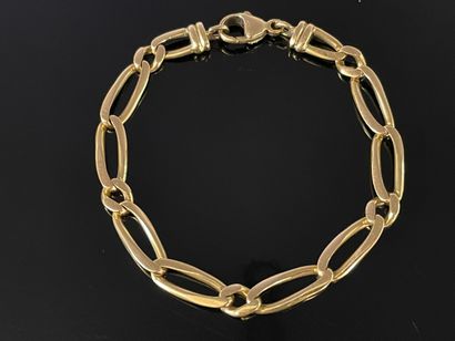 Bracelet gourmette en or 750°/00.

12.85...