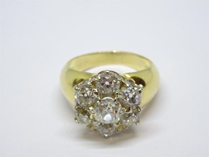 Bague en or jaune 750°/00, serti de sept...
